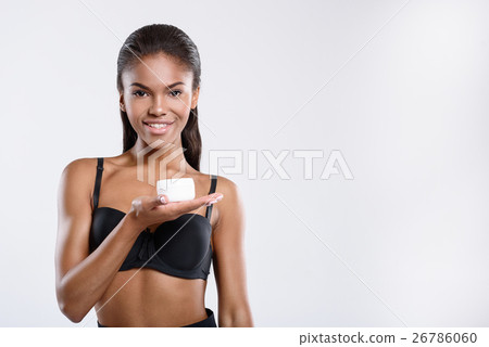 Model presenting beauty product 26786060