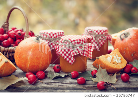 Pumpkin jam, puree or sauce and hawthorn berries. 26786747