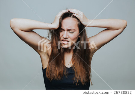 Young pretty female in despair Young pretty female in despair 26788852