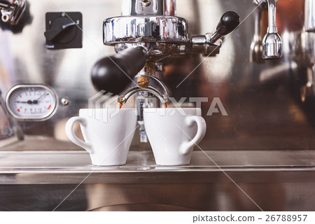 front view of the coffee machine working front view of the coffee machine working 26788957