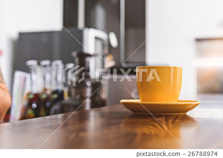 Mug of hot beverage in cafe 26788974