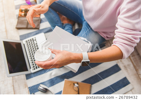 Girl holding showing cosmetic product 26789432