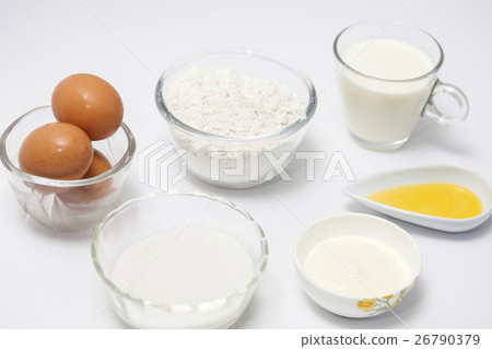 Ingredients to prepare crepes on white background Ingredients to prepare crepes on white background 26790379