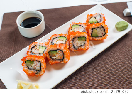 sushi are served on the table with sushi are served on the table with 26791082