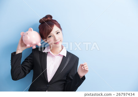 woman take pink piggy bank 26797434