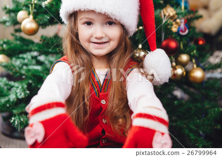 Cheerful girl in red hat Cheerful girl in red hat 26799964