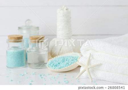 White towel with aromatherapy spa tools White towel with aromatherapy spa tools 26808541