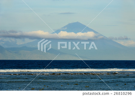 Blue sea with waves and mount on background Blue sea with waves and mount on background 26810296