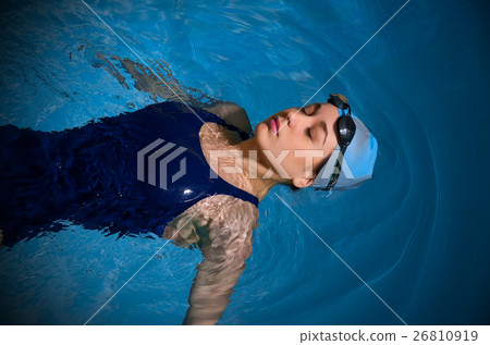 Young woman swimmer Young woman swimmer 26810919
