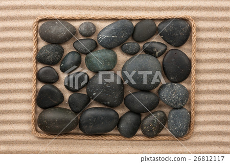 Frame made of rope with black stones Frame made of rope with black stones 26812117