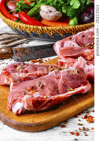 Raw meat on cutting board Raw meat on cutting board 26813922