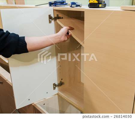 Assembling of furniture closeup Assembling of furniture closeup 26814030