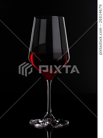 Glass of red wine with reflection on black Glass of red wine with reflection on black 26814679