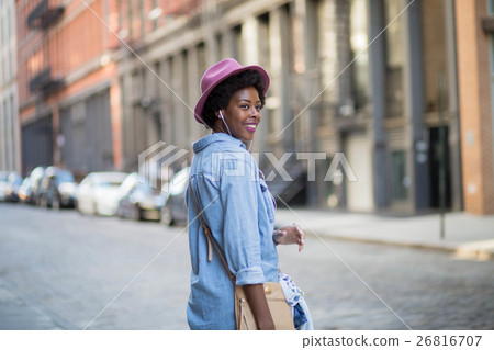 Portrait of African American woman in city street Portrait of African American woman in city street 26816707