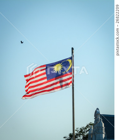 Malaysia flag waving on the blue sky 26822209