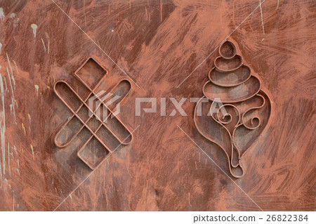 Dharma Wheel Buddhist symbol in old door 26822384