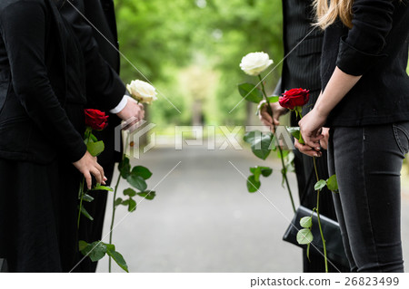 Family in guard of honor at funeral 26823499