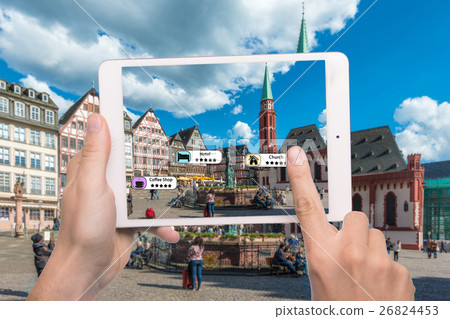 Hand holding smart phone use AR application Hand holding smart phone use AR application 26824453