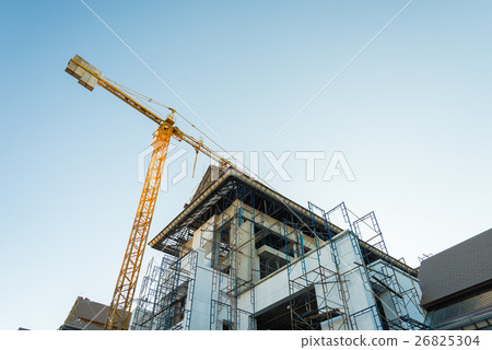 Construction crane and buildings. Construction crane and buildings. 26825304