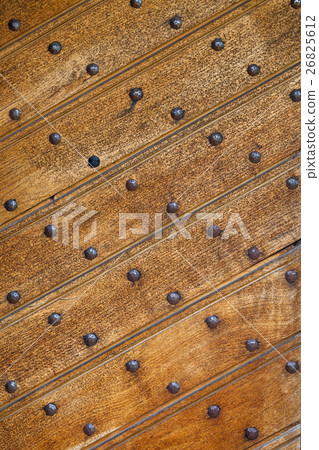 Old wooden background with nails 26825612