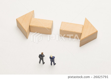 A businessman standing at a turning point 26825791