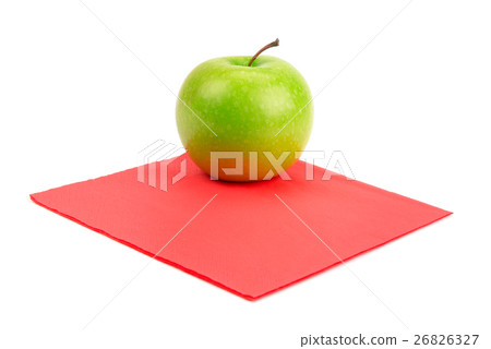 Green apple on red napkin Green apple on red napkin 26826327