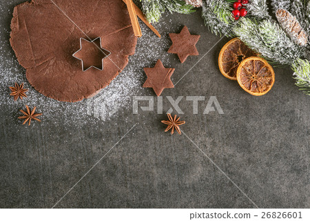 christmas baking gingerbread with cutters  26826601