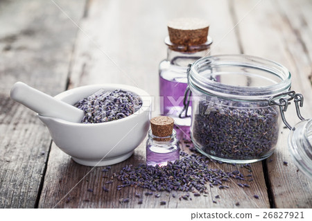 Dry lavender in mortar, jar of lavender and oil Dry lavender in mortar, jar of lavender and oil 26827921
