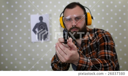 man with put on protective goggles ear training 26837380