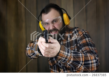 man with put on protective goggles ear training 26837385