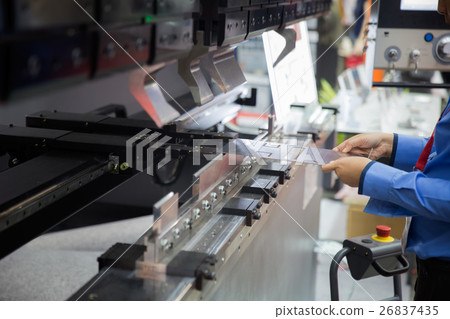 operator bending metal sheet by sheet bending 26837435