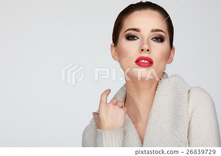 beautiful woman portrait in warm clothing beautiful woman portrait in warm clothing 26839729
