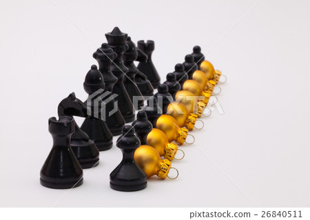 Black chess figure and golden Christmas decoration 26840511