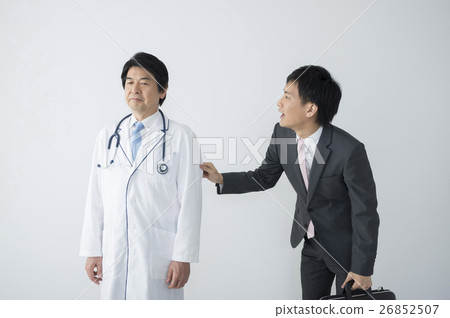Salesman clinging to a doctor 26852507