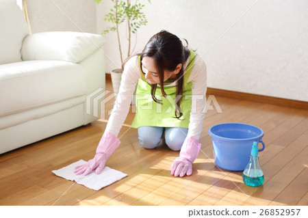 Woman cleaning the floor Woman cleaning the floor 26852957
