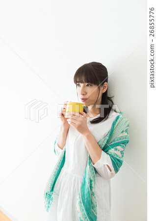 A woman with a mug A woman with a mug 26855776