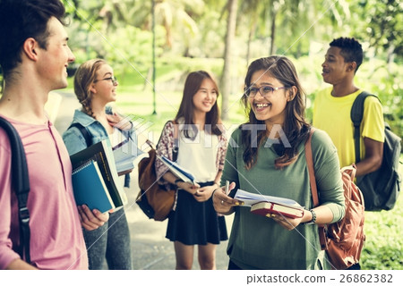 Diverse Young Students Book Outdoors Concept Diverse Young Students Book Outdoors Concept 26862382