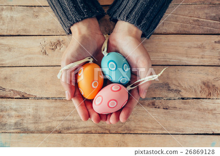 Close up hand woman holding and person easter eggs 26869128