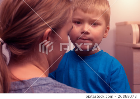 Mother and her little son hugging after quarrel Mother and her little son hugging after quarrel 26869378