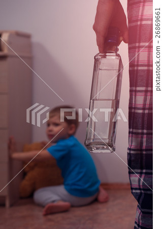 Little scared boy with toy bear and drunk mother 26869661