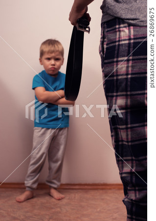 Angry boy and abusive mother with belt 26869675