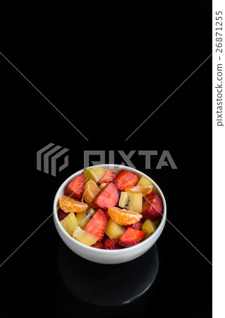 ftuits salad on the black background. ftuits salad on the black background. 26871255