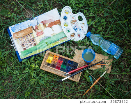 Used water based color paint in containers with a 26873532