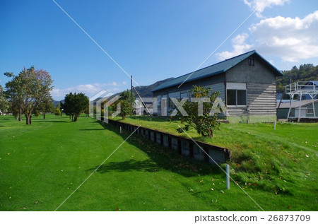 Lawn of a waste line trace and station building 26873709
