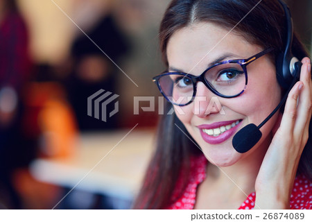 Young woman working in call centre Young woman working in call centre 26874089