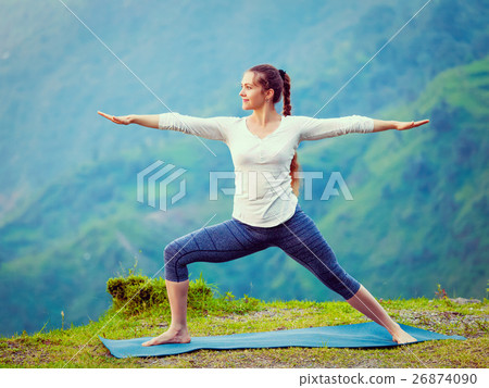 Woman doing Ashtanga Vinyasa Yoga asana Woman doing Ashtanga Vinyasa Yoga asana 26874090