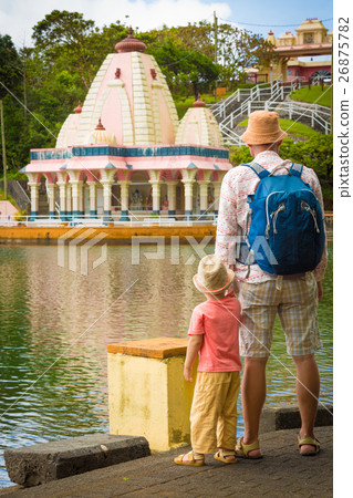 Father and child at Ganga Talao. Mauritius. Father and child at Ganga Talao. Mauritius. 26875782