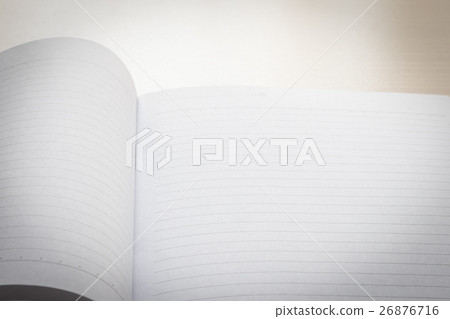 Open notebook with blank page 26876716