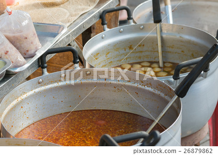 Food in pot is a hot curry Thai style food 26879862