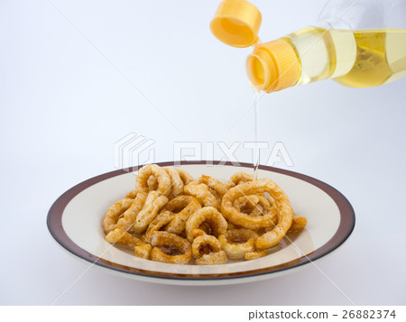 Crispy deep fried pork skin or pork rind in plate  26882374